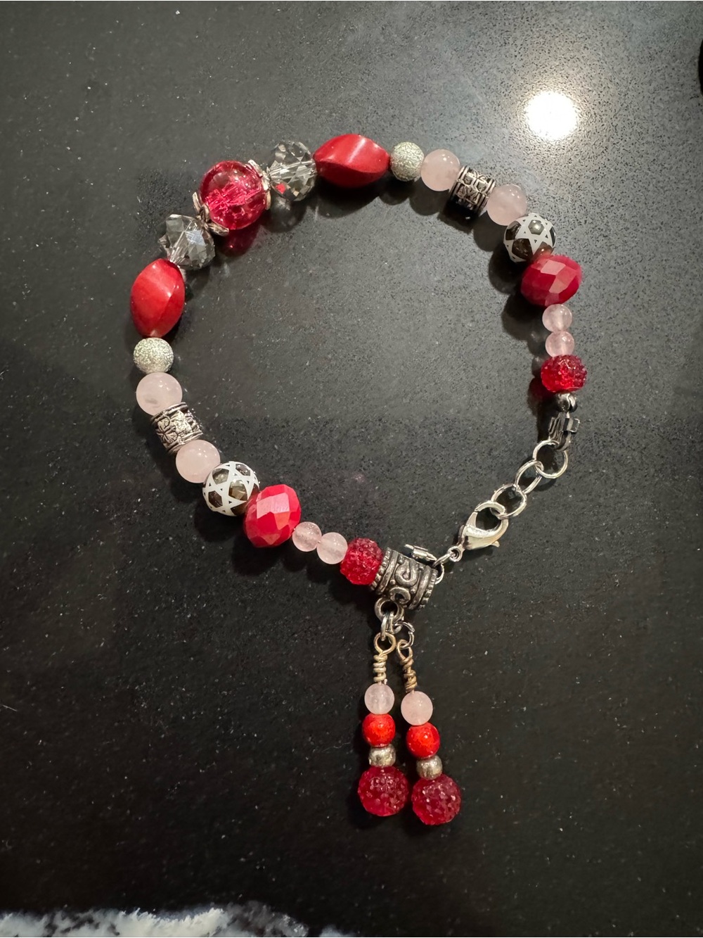 Handcrafted Red Beaded Charm Bracelet with Silver Accents